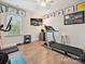 Home gym features a treadmill, exercise bike, and weights; perfect for fitness enthusiasts at 9405 Gladden Hill Ln, Pineville, NC 28134