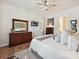 Spacious main bedroom with a large dresser and a view into the bathroom at 9405 Gladden Hill Ln, Pineville, NC 28134