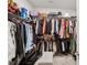 The walk-in closet is well-organized with ample shelving and hanging space at 9525 Festival Way, Charlotte, NC 28215