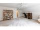 Large bonus room offers versatile space for a home office, playroom, or entertainment area at 9901 Pallisers Ter, Charlotte, NC 28210
