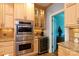 Gourmet kitchen with stainless steel appliances, granite countertops, and custom cabinetry at 9901 Pallisers Ter, Charlotte, NC 28210