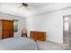 Spacious main bedroom with vaulted ceiling, soft carpet and traditional furniture at 9901 Pallisers Ter, Charlotte, NC 28210