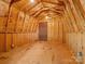 Unfinished shed interior featuring wooden framework and ample storage space at 1008 Midway Dr, Gastonia, NC 28054