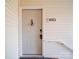 Front door to unit 1023 with digital lock, peep hole and welcome mat at 1023 Triece Ln, Charlotte, NC 28215