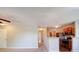 Bright living room featuring neutral decor and seamless flow into the kitchen and hallway at 1023 Triece Ln, Charlotte, NC 28215