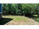 Well-maintained backyard with a lush lawn and secure black metal fencing at 1067 33Rd Avenue Ne Loop, Hickory, NC 28601