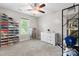 Well-lit bedroom featuring neutral carpet, and a modern ceiling fan at 1067 33Rd Avenue Ne Loop, Hickory, NC 28601