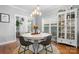 Bright dining room with a round table, seating for four, and natural light, perfect for Gathering meals at 1067 33Rd Avenue Ne Loop, Hickory, NC 28601