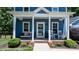 Charming front porch, complete with ample seating, rocking chairs and a welcoming entrance at 1067 33Rd Avenue Ne Loop, Hickory, NC 28601