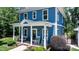 Charming two-story home with covered front porch, rocking chairs and a welcoming entryway at 1067 33Rd Avenue Ne Loop, Hickory, NC 28601