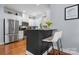 Modern kitchen with stainless steel appliances, white cabinets, and a breakfast bar for casual dining at 1067 33Rd Avenue Ne Loop, Hickory, NC 28601