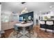 Open concept living and dining area with hardwood floors and modern lighting at 1067 33Rd Avenue Ne Loop, Hickory, NC 28601
