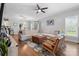 Open-concept living area featuring a comfortable sectional sofa, hardwood floors, and modern decor at 1067 33Rd Avenue Ne Loop, Hickory, NC 28601