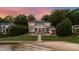 Backyard features a sandy beach, slide, fire pit and large grassy area, perfect for outdoor activities at 123 Sailview Rd, Mooresville, NC 28117