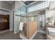 Modern bathroom featuring a glass shower enclosure, and gray tile flooring at 123 Sailview Rd, Mooresville, NC 28117