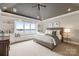 Cozy bedroom with lake views, built-in shelving, and a comfortable bed at 123 Sailview Rd, Mooresville, NC 28117