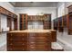 A luxurious closet featuring custom built-ins and a marble countertop island at 123 Sailview Rd, Mooresville, NC 28117