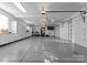 Spacious garage with storage cabinets, offering ample space for vehicles and organizational needs at 123 Sailview Rd, Mooresville, NC 28117