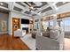 Living area with fireplace and custom built-ins offers spectacular views of lake at 123 Sailview Rd, Mooresville, NC 28117