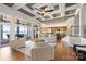 Bright living space with access to outdoor patio and views of lake from large windows at 123 Sailview Rd, Mooresville, NC 28117