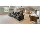 Enjoy movie nights in this room with comfortable seating, adjacent to the game room at 123 Sailview Rd, Mooresville, NC 28117