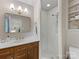 Updated bathroom with sleek vanity, a frameless glass shower, and modern finishes at 1723 Woodland Dr, Charlotte, NC 28205
