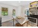 Functional kitchen layout with an island, stainless steel appliances, and ample storage space at 1723 Woodland Dr, Charlotte, NC 28205