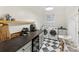 Well-equipped laundry room with modern washer and dryer, storage and countertop space at 1723 Woodland Dr, Charlotte, NC 28205