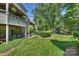 Expansive backyard with lawn and view of pond and neighborhood at 2533 Stockbridge Dr, Charlotte, NC 28210