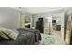 Comfortable bedroom with a sliding glass door to outdoor, wood-look floors, and a spacious layout at 2533 Stockbridge Dr, Charlotte, NC 28210