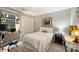 Cozy bedroom with a desk, closet, and neutral decor creating a calming atmosphere at 2533 Stockbridge Dr, Charlotte, NC 28210