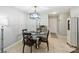 Dining area with stylish chandelier and easy access to kitchen at 2533 Stockbridge Dr, Charlotte, NC 28210