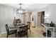 Dining area with stylish chandelier and easy access to kitchen at 2533 Stockbridge Dr, Charlotte, NC 28210