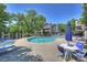 Inviting community pool with ample lounge chairs and tables, perfect for relaxing on sunny days at 2533 Stockbridge Dr, Charlotte, NC 28210