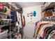 Organized walk-in closet featuring metal shelving and plenty of storage space at 2533 Stockbridge Dr, Charlotte, NC 28210