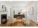 Stylish home office with fireplace, modern desk, and hardwood floors at 2919 Wickersham Rd, Charlotte, NC 28211