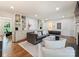 Comfortable living room with built-in shelving, fireplace, and cozy seating at 2919 Wickersham Rd, Charlotte, NC 28211