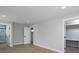 Bedroom featuring a modern ensuite bathroom and a well-organized walk-in closet at 304 Cabarrus W Ave, Concord, NC 28025