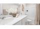 Modern bathroom with double sinks, decorative elements, and a shower/tub combination at 3734 Coleman Dr, Charlotte, NC 28215