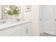 Bright bathroom with a double sink vanity, modern fixtures, and ample counter space, offering a clean and functional design at 3734 Coleman Dr, Charlotte, NC 28215