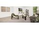 Cozy living room featuring modern furniture, natural light from a large window, and stylish decor for comfortable living at 3734 Coleman Dr, Charlotte, NC 28215