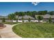 Landscaped community with walking paths and lush green lawn; well-maintained lawn at 4014 Pleasant Run Dr, Stallings, NC 28227