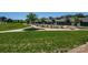Community common area featuring landscaped lawns, bocce ball, and walking paths at 4014 Pleasant Run Dr, Stallings, NC 28227