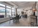 Bright dining area featuring an open floor plan, large windows, and modern decor at 4014 Pleasant Run Dr, Stallings, NC 28227