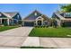 Charming home featuring stone accents, a well-manicured lawn, and an attached two-car garage at 4014 Pleasant Run Dr, Stallings, NC 28227