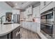 Bright kitchen featuring stainless steel appliances, white cabinetry, and a center island at 4014 Pleasant Run Dr, Stallings, NC 28227