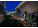 This backyard is adorned with vibrant landscaping, decorative rocks, and serene water features, creating a tranquil outdoor escape at 4014 Pleasant Run Dr, Stallings, NC 28227