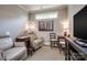 Cozy living room featuring a recliner, decorative rug, and accent table at 4014 Pleasant Run Dr, Stallings, NC 28227