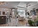 Bright living room showcasing an open layout, neutral color scheme, and large windows at 4014 Pleasant Run Dr, Stallings, NC 28227