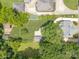 Overhead view showcasing the expansive lot, detached garages, and landscaping at 420 S Cedar St, Lincolnton, NC 28092